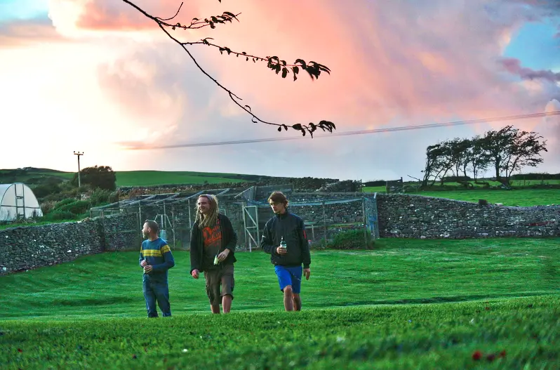 Evening light across the field during the historic Magic Orchard chapter at Cowran