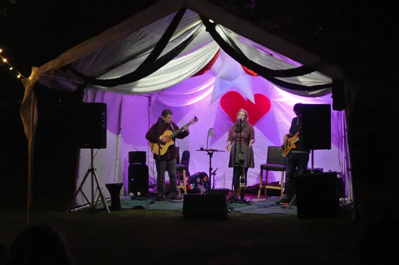 A small stage lit at Magic Orchard in a 2015 Cowran Estate archive photograph